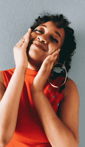 Woman applying shea butter on face - Better Shea Butter